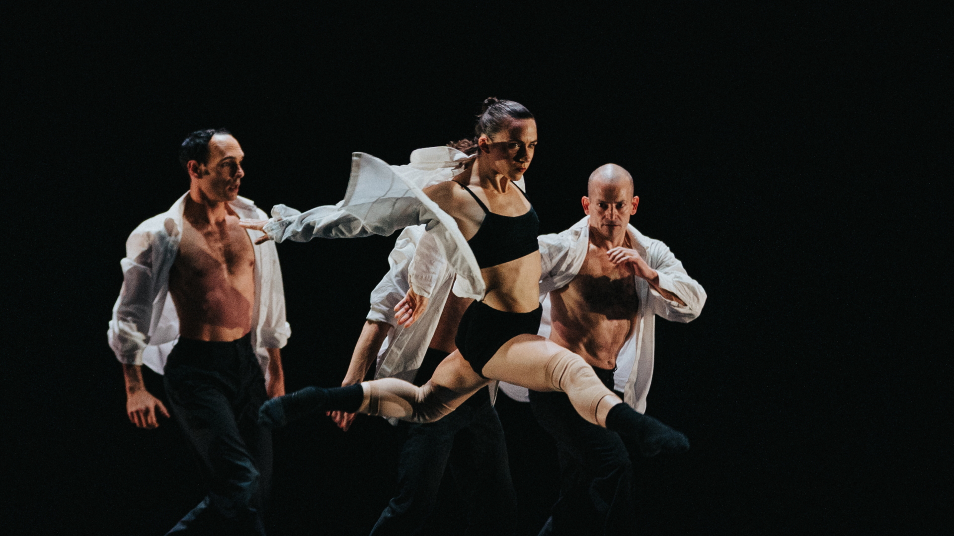 a group of ODC dancers, holding one dancer aloft