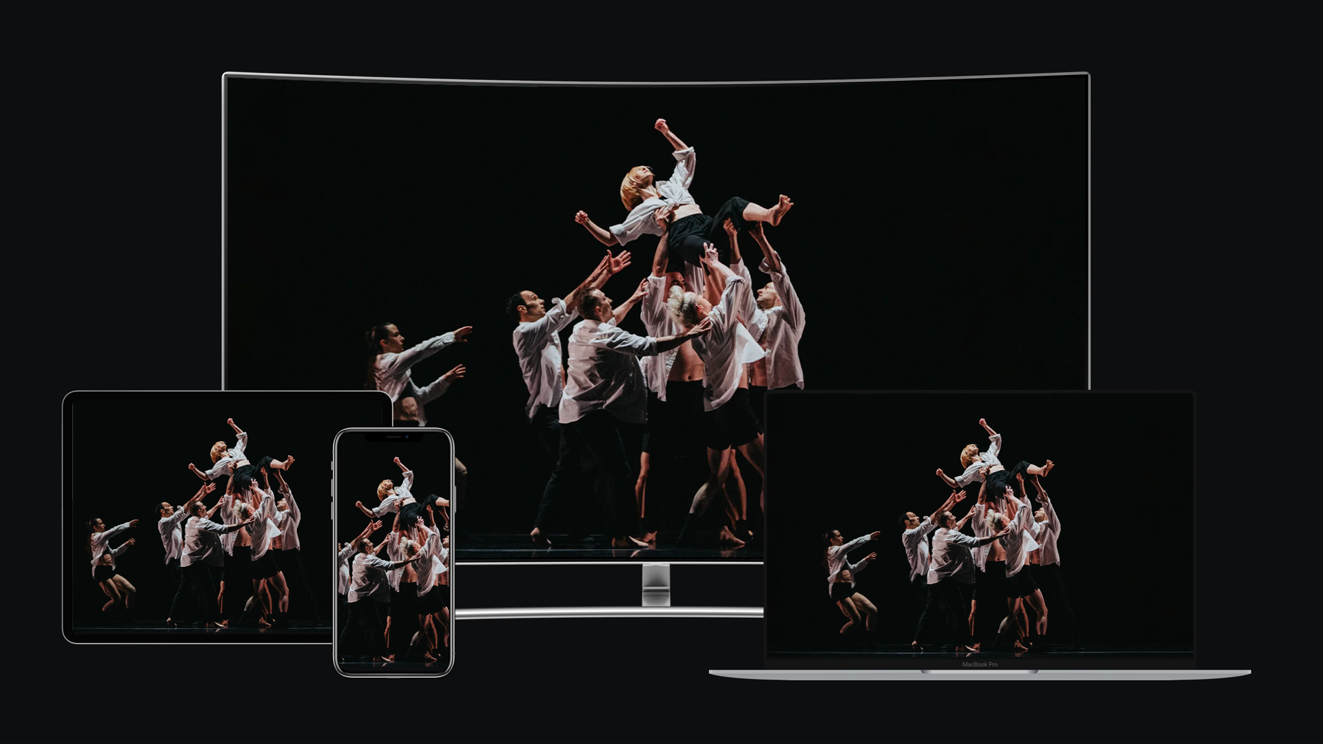 a group of ODC dancers, holding one dancer aloft