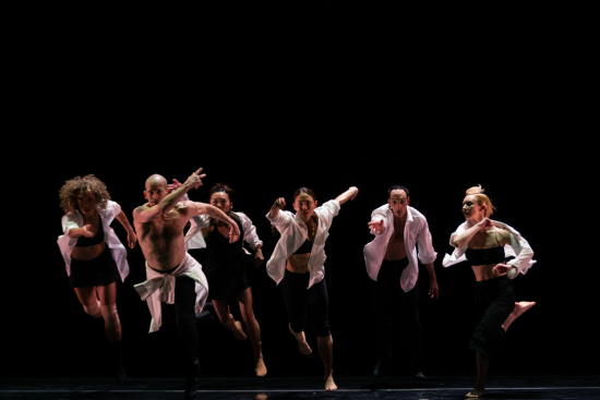 ODC/Dance Company Touring Brochure Dancers in white shirts running toward the viewer
